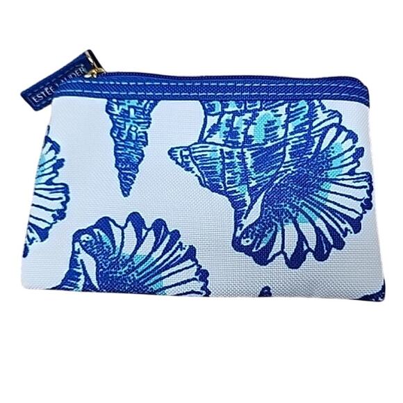 Estée Lauder Handbags - Estee Lauder Blue and white cosmetic bag/ coin purse measures 5x4x.75